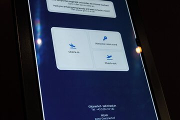 Check-in/check-out kiosk