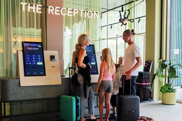 Check-in/check-out kiosk