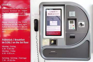 Check-in/check-out kiosk