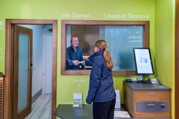 Check-in/check-out kiosk