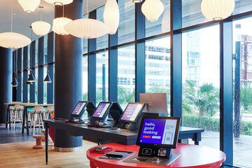 Check-in/check-out kiosk