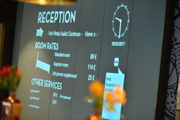 Check-in/check-out kiosk