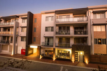 Hotel Front - Evening or Night