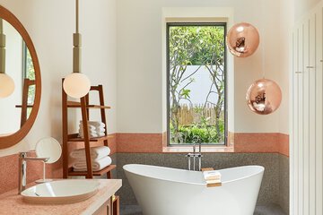 Raised toilet seat