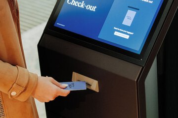 Check-in/check-out kiosk