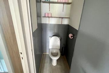Raised toilet seat