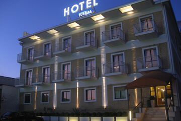 Front of property - evening/night