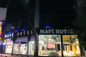 Hotel Front - Evening or Night