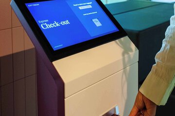 Check-in/check-out kiosk
