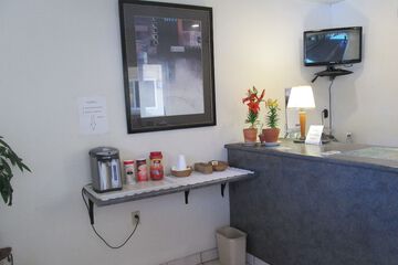 Check-in/check-out kiosk