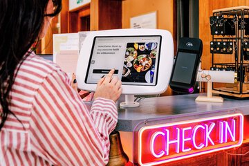 Check-in/check-out kiosk