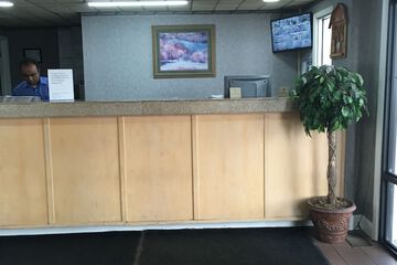 Check-in/check-out kiosk
