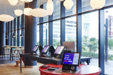 Check-in/check-out kiosk