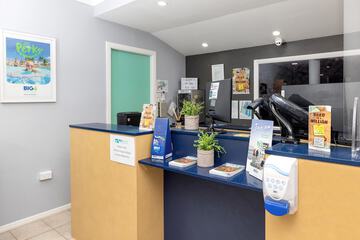 Check-in/check-out kiosk