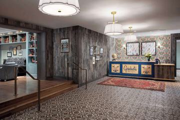 Graduate by Hilton State College