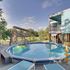Sunny Waveland Home Rental w / Pool: Walk to Beach!