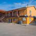 EXECUTIVE INN AND SUITES