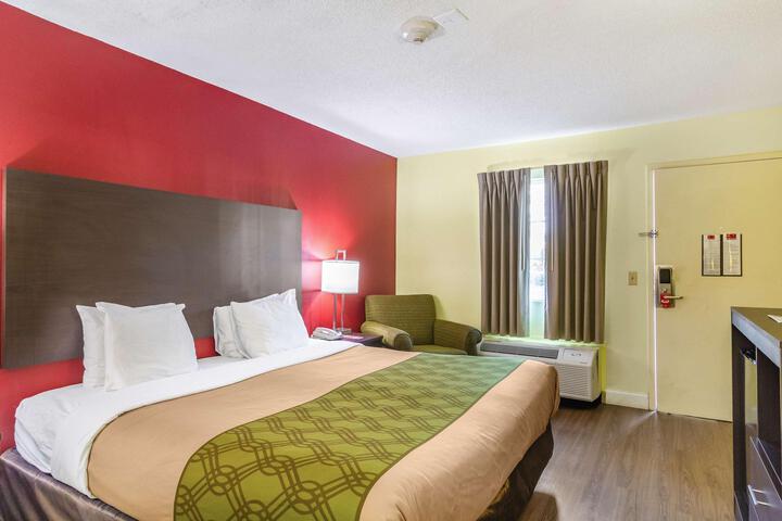 1 King Bed Ground Floor Exterior Entrance Couch Microwave and Refrigerator WiFi Contin (11 of 16)