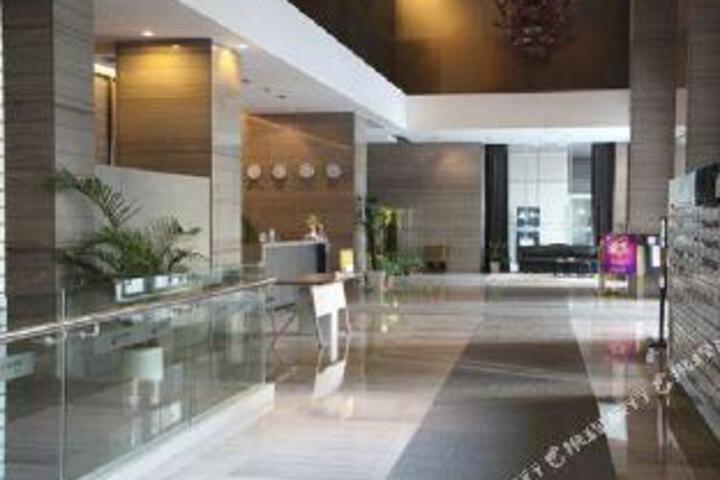Orange Jin Xin House Apartment Hotel