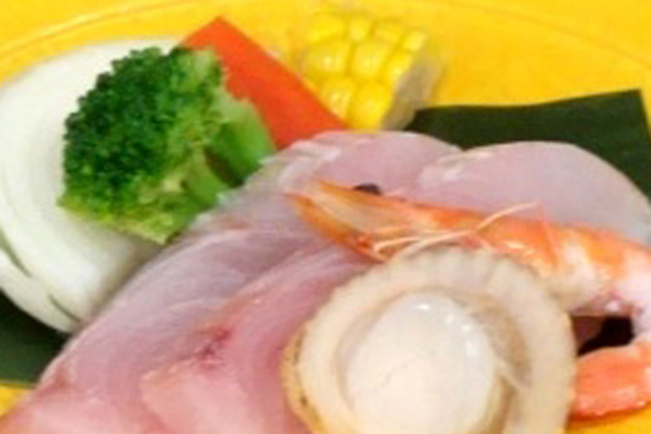Grilled seafood on a ceramic plate