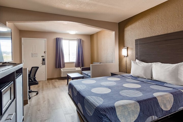 1 King Bed Flat Screen Television Microwave and Refrigerator High Speed Internet Accessible (8 of 8)