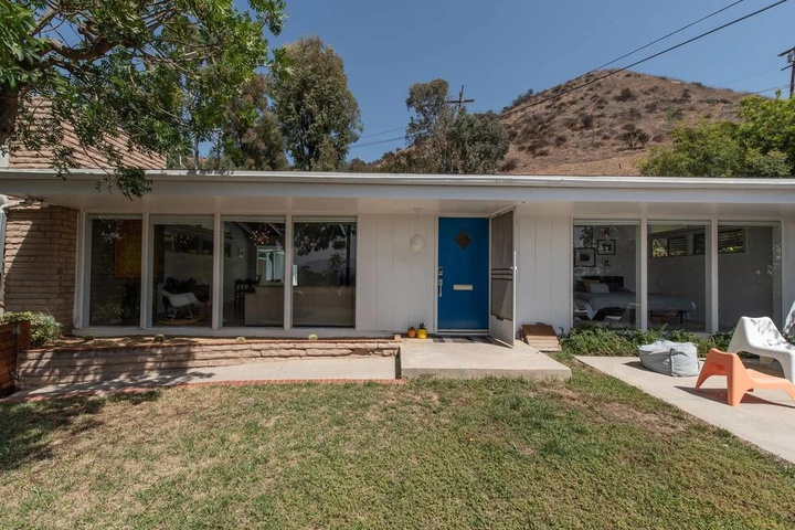 Exterior of Mid-mod Pool Home With Palm Springs Vibe 2bdr