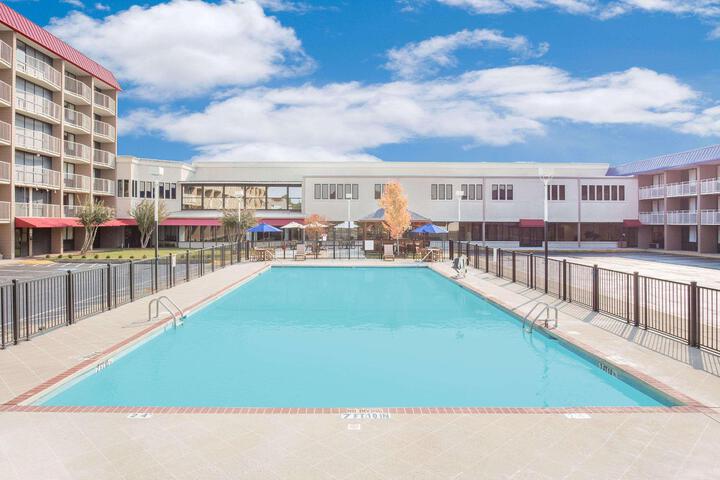 Pool image of Ramada Plaza by Wyndham Fayetteville Fort Bragg Area