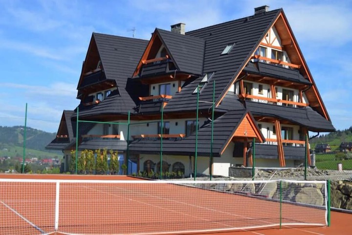 Tennis and Basketball Courts 30 of 58