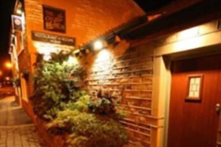 Front of property - evening/night