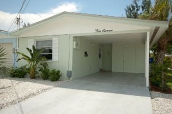 Exterior of Holmes Beach Super Cute Home 411 by RedAwning