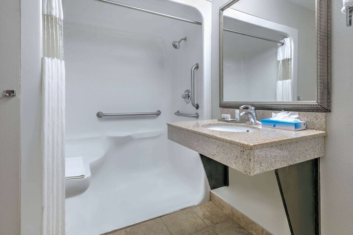 1 King Bed Accessible Room Roll in Shower (3 of 20)