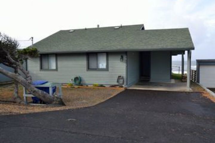 Exterior of Oceanfront Solitude by RedAwning