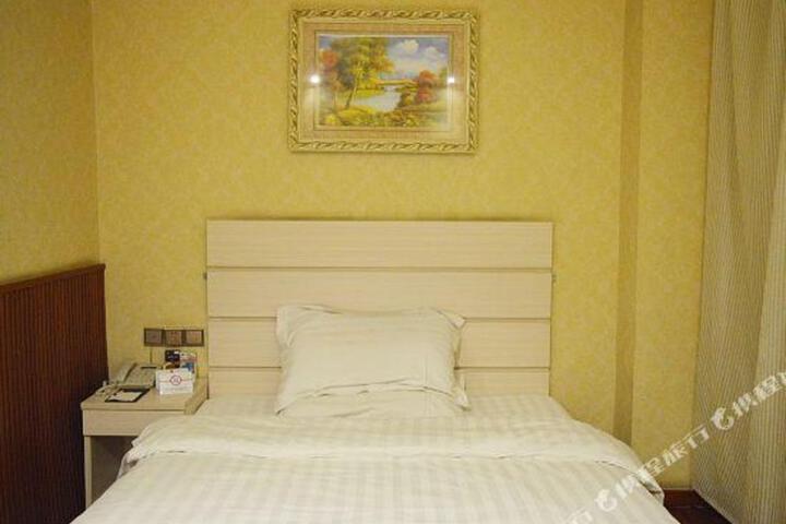 Wanlong Business Hotel