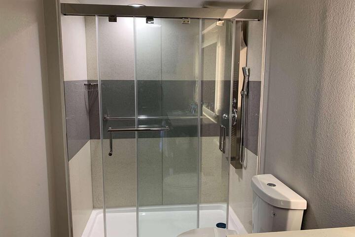 1 King Bed Mobility Accessible Roll in Shower (8 of 12)