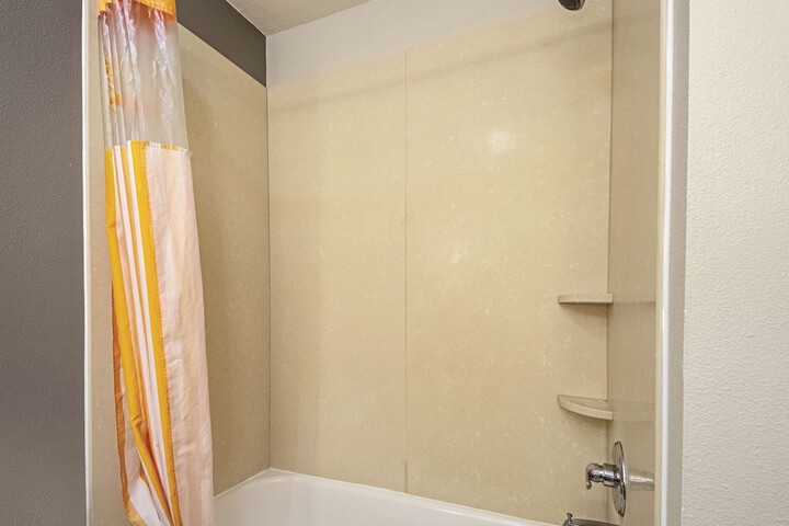 1 King Bed Mobility Hearing Accessible Room Bathtub with Grab Bars (22 of 22)
