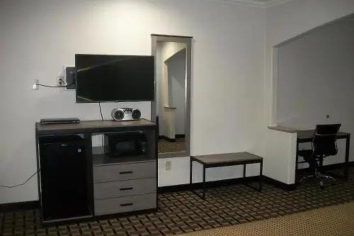Photo of WOODLAND INN AND SUITES