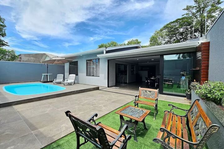 Casa Central piscina e AC para 8 hospede