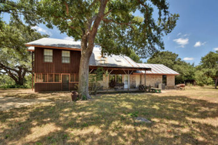 Exterior of Country Home with All the Fixings by RedAwning