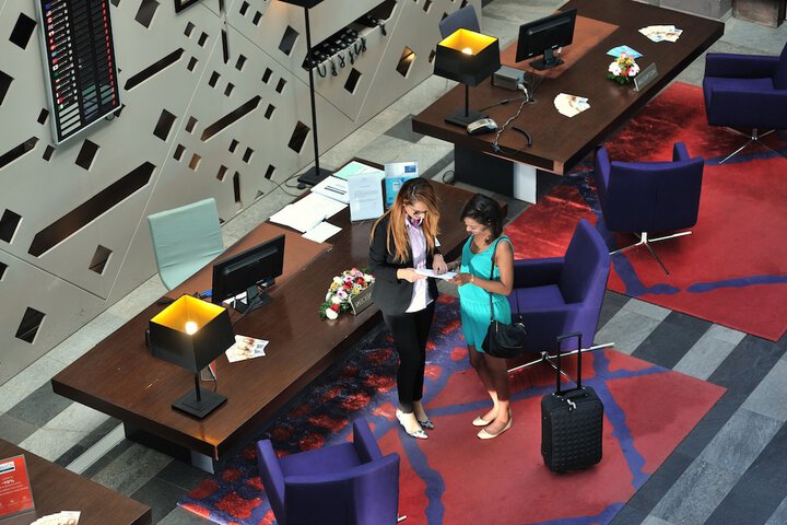 Check-in/check-out kiosk