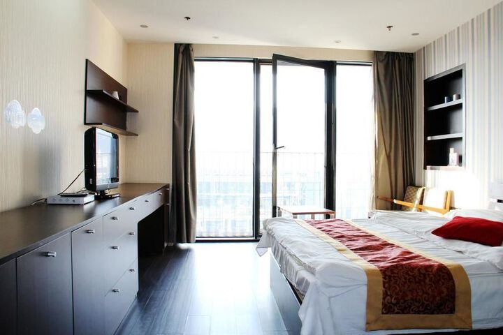 Enji Apartment Hotel Bainianhui Dalian