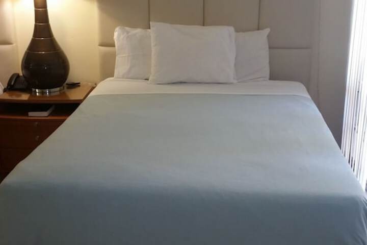 Executive Double Room 2 Queen Beds Pool View Garden Area (2 of 5)