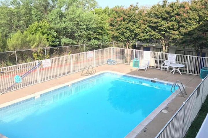 Pool image of AMERICAN INN