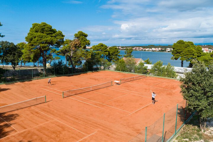 Tennis and Basketball Courts 48 of 83