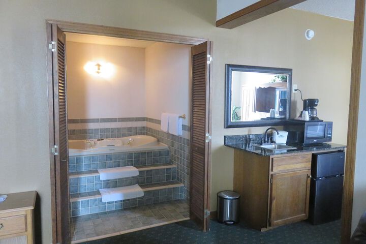 1 King Bed Mobility Accessible Roll in Shower (3 of 26)