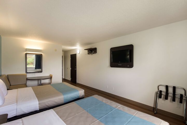 Deluxe Room 2 Queen Beds Refrigerator, Microwave (2 of 5)