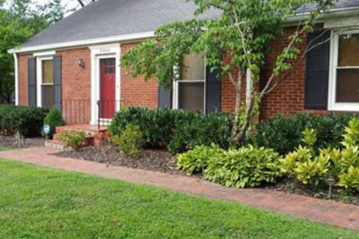 Exterior of Charming Home on Battlemont Park by RedAwning