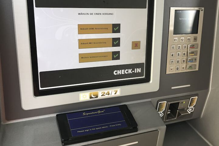 Check-in/check-out kiosk