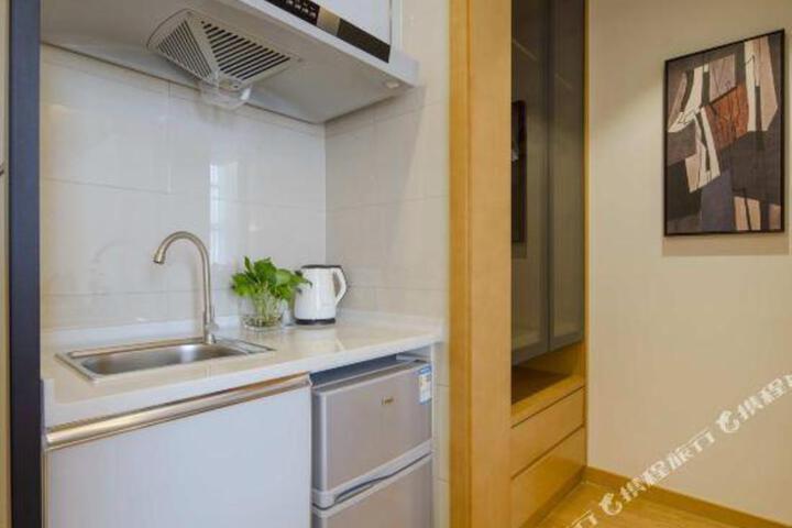 Maoyuan Qiluo Pushi Apartment Hotel