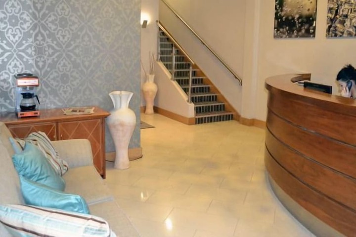 Carrick Plaza Suites & Apartments