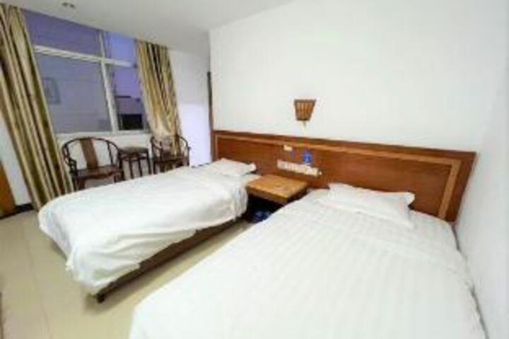 Yulin Mingxin Hotel (Qingning Road Maternity and Child Hospital Shop)